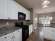 Kitchen with stainless steel appliances, granite countertops and breakfast nook in view at 5 Glenn Eagles Vw, Hiram, GA 30141