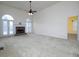 Bright living room with vaulted ceiling, stone fireplace, arched windows and doors, plus neutral decor at 5 Glenn Eagles Vw, Hiram, GA 30141