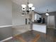 Open concept living room with view of kitchen, dining area, neutral decor, and ample lighting at 5 Glenn Eagles Vw, Hiram, GA 30141