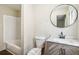 Modern bathroom featuring a decorative vanity, new toilet and shower/tub combo at 6192 Holiday Blvd, Forest Park, GA 30297