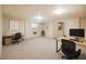 Bright home office space with two desks, perfect for remote work or study at 6192 Holiday Blvd, Forest Park, GA 30297