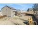 Large fenced backyard with a hot tub, wooden playset, and a view of neighboring homes at 157 Donovan Ave, Locust Grove, GA 30248
