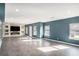 Spacious basement featuring recessed lighting, a stone fireplace, and several windows at 157 Donovan Ave, Locust Grove, GA 30248