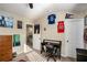A sports-themed bedroom featuring natural light, with various sports memorabilia displayed on the walls at 157 Donovan Ave, Locust Grove, GA 30248