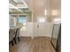 Bright entryway with white wainscoting, a wood-look floor, and coffered ceilings at 157 Donovan Ave, Locust Grove, GA 30248