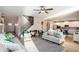 Open living space with view of kitchen, staircase, and hardwood floors at 157 Donovan Ave, Locust Grove, GA 30248