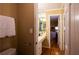 Bathroom featuring a vanity with a mirror and a doorway leading to a bedroom at 3548 Liberty Ln, Marietta, GA 30062