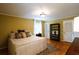 Comfortable bedroom with hardwood floors, stylish décor, and a large window for natural light at 3548 Liberty Ln, Marietta, GA 30062