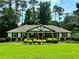 Charming ranch-style home with a manicured lawn, mature trees, and inviting curb appeal at 3548 Liberty Ln, Marietta, GA 30062