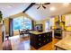 Bright eat-in kitchen with stainless steel appliances, granite counters, large island, and breakfast nook at 3548 Liberty Ln, Marietta, GA 30062