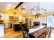 Eat-in kitchen with island, stainless appliances, granite countertops, and adjoining dining room at 3548 Liberty Ln, Marietta, GA 30062