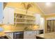 Kitchen with stainless steel appliances, granite countertops, and white cabinets at 3548 Liberty Ln, Marietta, GA 30062