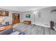 Living room showcases gray walls, hard surface floors, television and comfortable seating at 6338 Boyett Dr, Norcross, GA 30093