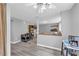 The living room features hardwood flooring and gray paint, with great access to the kitchen at 6338 Boyett Dr, Norcross, GA 30093