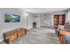 Living room with hard surface flooring, television, staircase, and comfortable seating at 6338 Boyett Dr, Norcross, GA 30093