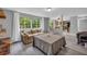Open living room showcasing hardwood floors, neutral decor, and seamless connection to kitchen at 6338 Boyett Dr, Norcross, GA 30093
