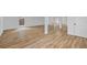 Finished basement featuring new wood-look flooring, white walls, and large windows at 944 Herndon Nw St, Atlanta, GA 30318