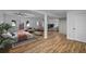 Spacious basement area with wood flooring and modern design, offering flexible living space at 944 Herndon Nw St, Atlanta, GA 30318