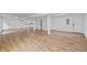 Large finished basement with modern flooring and white walls, ready to be customized at 944 Herndon Nw St, Atlanta, GA 30318
