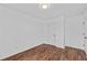 Bedroom featuring hardwood floors, fresh paint, and a blank canvas for the new homeowner at 944 Herndon Nw St, Atlanta, GA 30318