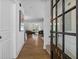 Welcoming entryway flows into a spacious living area with hardwood floors and ample natural light at 944 Herndon Nw St, Atlanta, GA 30318