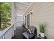 Inviting front porch with comfortable seating area, perfect for relaxing and enjoying the outdoors at 944 Herndon Nw St, Atlanta, GA 30318