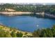 Beautiful view of the tranquil lake surrounded by trees, offering a peaceful escape at 944 Herndon Nw St, Atlanta, GA 30318