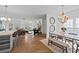 Open-concept living area with a fireplace, dining space, and plenty of natural light for gatherings at 944 Herndon Nw St, Atlanta, GA 30318