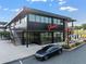 Modern, multi-story restaurant with outdoor seating, large glass windows, and a stylish exterior at 944 Herndon Nw St, Atlanta, GA 30318