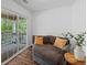 Bright sitting room with comfortable seating and sliding glass doors to private deck at 944 Herndon Nw St, Atlanta, GA 30318