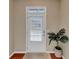 Bright entryway featuring a white front door with glass insert and a potted plant at 1936 Lakeshore Overlook Circle Nw Cir, Kennesaw, GA 30152