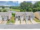 Charming townhomes with attached garages and well-kept lawns near a scenic pond at 1936 Lakeshore Overlook Circle Nw Cir, Kennesaw, GA 30152