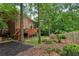 Brick home with inviting backyard and outdoor deck perfect for entertaining and relaxing at 2145 Sugarstone Ct, Lawrenceville, GA 30043
