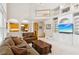 Spacious living room with built-in cabinets and open floor plan at 2145 Sugarstone Ct, Lawrenceville, GA 30043