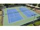 Enjoy the outdoors with these pristine blue tennis courts ready for a friendly match at 2145 Sugarstone Ct, Lawrenceville, GA 30043