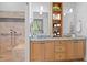 This stylish bathroom offers a walk-in shower, a double vanity, and a marble countertop for a spa-like feel at 407 Westside Dr, Roswell, GA 30075