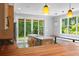 Modern kitchen with island, stainless steel appliances, and bright breakfast nook at 407 Westside Dr, Roswell, GA 30075