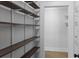 Pantry with adjustable shelving, and an open layout for storage and organization at 407 Westside Dr, Roswell, GA 30075