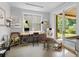 Bright studio with large windows, natural light, and exterior access through sliding glass doors at 407 Westside Dr, Roswell, GA 30075