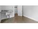 A utility sink stands in a room with polished concrete floors at 407 Westside Dr, Roswell, GA 30075