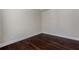 Bright bedroom features hardwood floors and neutral walls, offering a clean and versatile space at 7790 Stratford Ln, Atlanta, GA 30350
