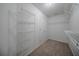 Spacious walk-in closet with adjustable wire shelving and door at 40 Heather Woods Ct, Covington, GA 30016