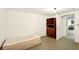 Basement with built-in storage, painted floor, and an open doorway to another room offering potential for customization at 6126 Knights Ln, Douglasville, GA 30135