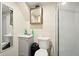 Bathroom featuring a corner shower, vanity, and mirror at 6126 Knights Ln, Douglasville, GA 30135