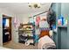 Bedroom with doorway access and shelving for storage at 6126 Knights Ln, Douglasville, GA 30135
