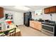 Functional kitchen features a black refrigerator and plenty of storage space at 6126 Knights Ln, Douglasville, GA 30135
