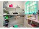 Well-organized pantry with ample shelving and natural light at 6126 Knights Ln, Douglasville, GA 30135