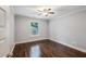 Charming bedroom with hardwood floors, ceiling fan, and natural light at 1735 Jobeth Se Ave, Atlanta, GA 30316