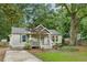 Charming home with inviting curb appeal and mature landscaping at 1735 Jobeth Se Ave, Atlanta, GA 30316
