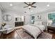 Serene main bedroom featuring a luxurious ensuite bathroom and hardwood floors at 1735 Jobeth Se Ave, Atlanta, GA 30316
